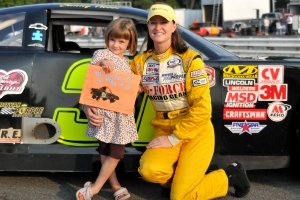 Sunny Hobbs poses with her daughter in front of her car.<br />(Photo credit: Lake Anna Photography by Lisa)